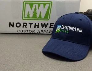 Luman Field embroidered caps by NW Custom Apparel